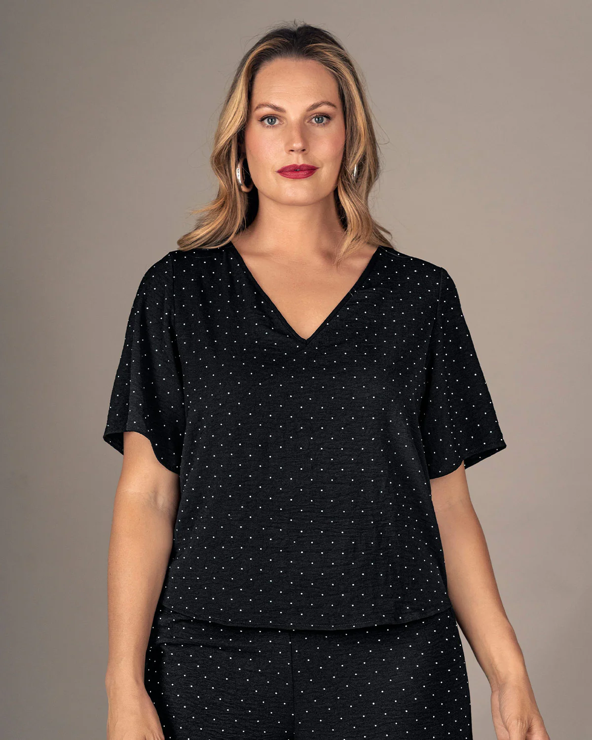 Blusa manga corta con apliques brillantes